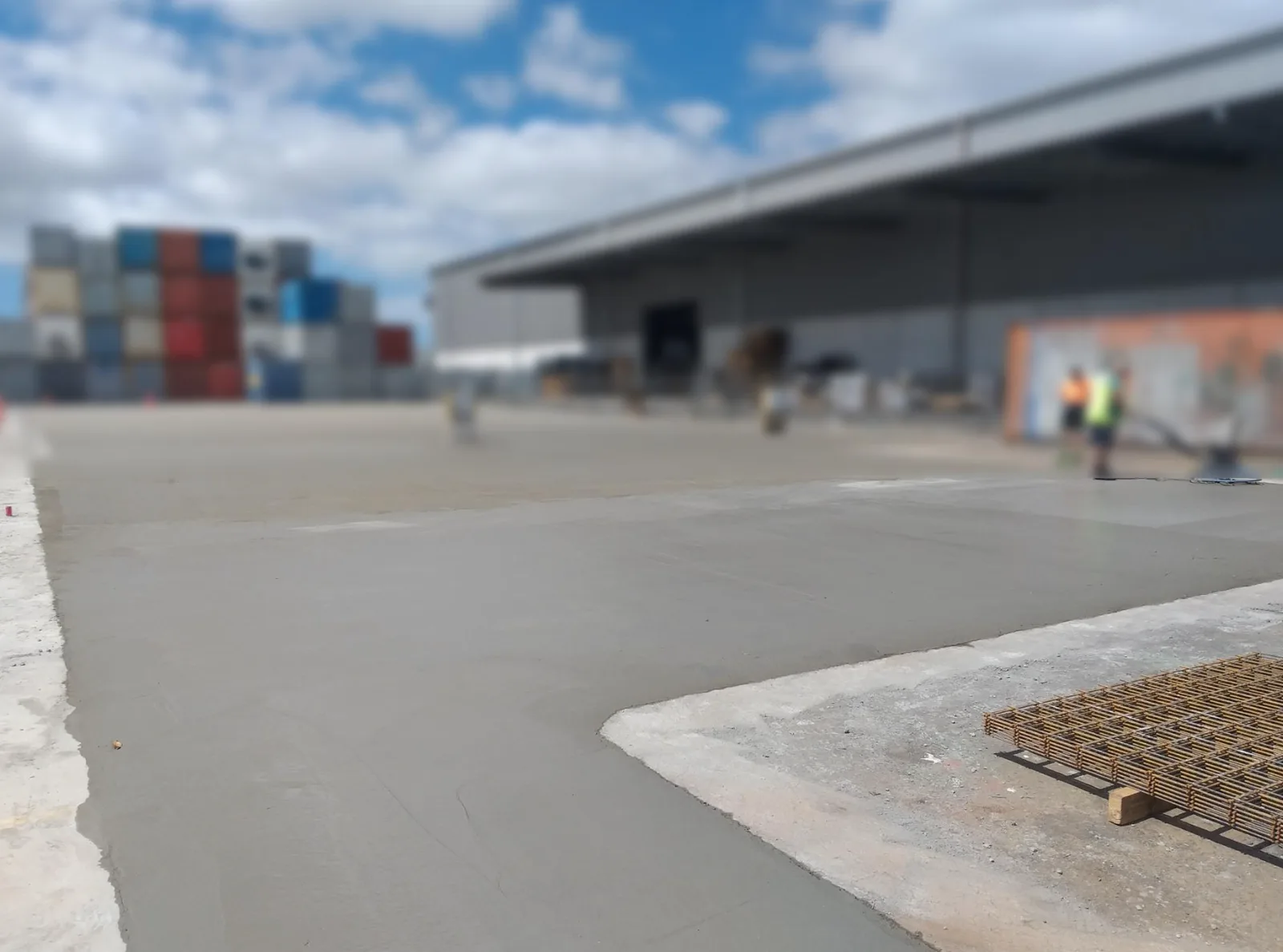 Finished concrete slab at a commercial warehouse yard